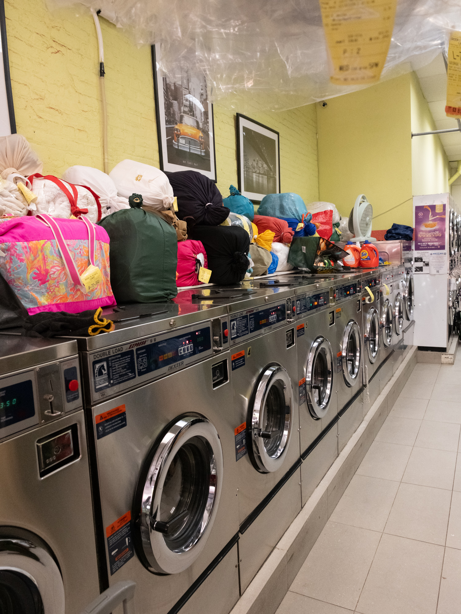 Bags of laundry ready for wash and fold drop-off service